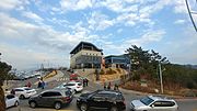 The cable car station and parking lot in the park (2017)