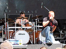 Shannon Lucas (left) performing with All That Remains in 2006