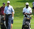 Ernie Els and Club Caddie Trevor Spencer during the 2006 Buick Classic