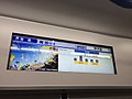 車内LCD。停車駅に近づいた際、その駅にちなんだスポットの画像が表示される（写真は甲子園駅のもの）。