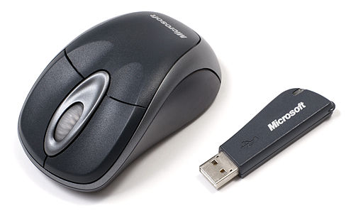 An older Microsoft wireless mouse made for notebook computers