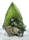 Olive-green titanite spear point set in matrix from Pakistan