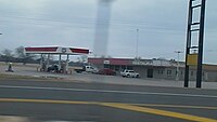 Gas station and closed restaurant at junction with Highway 7