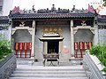 Image 2A Mazu temple in Shek Pai Wan; It clearly shows traits of classical Lingnan style - pale colour, rectangular structures, use of reliefs, among others. (from Culture of Hong Kong)