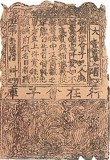 A brown piece of paper, about one and a half times as long as it is wide, divided into two sections. The larger top section contains a large block of text, framed by a thick border that itself contains text. The smaller bottom section contains a line drawing, heavily distorted by age, possibly of a garden.