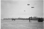 LST-60 and USS LST-30 along with two unidentified LSTs beached at Normandy, after 6 June 1944