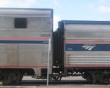 Two silver railcars