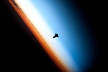 Space Shuttle Endeavour prior to rendezvous with the International Space Station, by NASA