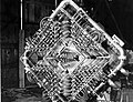 HD.6B.431 - Front view of the strong focusing magnet used to narrow down external beams of charged nuclear particles which emerge from the Cosmotron (not shown) at Brookhaven National Laboratory. c. 1957