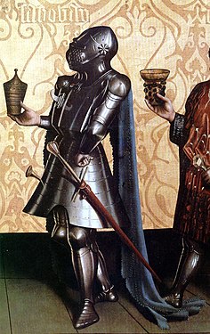 Knight wearing a great bascinet. The strap fixing the helmet to the breastplate is visible as is the impossibility of rotating the helmet. German painting of 1435, by Konrad Witz