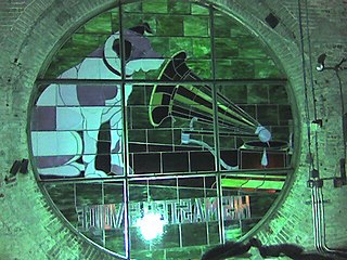 One of 4 Nipper stained glass windows seen from inside the "Nipper Tower" in the old RCA Victor Building 17[73]