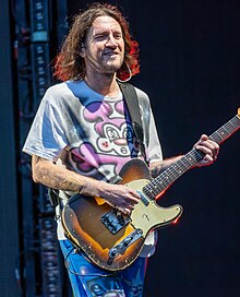 Frusciante performing in 2023