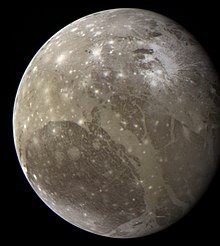 Ganymede looks like the Moon, with craters and darker and lighter grey regions