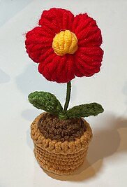 An amigurumi potted flower