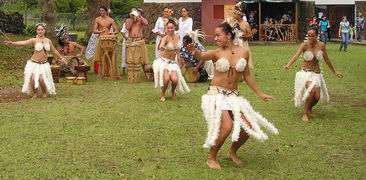 Polynesian dancing with feather costumes is on the tourist itinerary.
