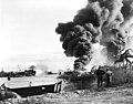 West Loch disaster with LST-39 and LST-480 still afire on 22 May 1944