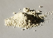 Photo of a sample of ammonium vanadate