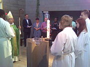 Confirmation being administered in an Anglican church