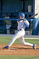 Image 6A batter follows through after swinging at a pitched ball. (from Baseball rules)