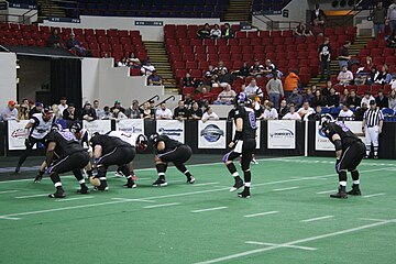 Quarterback Ryan Maiuri taking a snap against the Chicago Slaughter on March 21, 2008, at U.S. Cellular Arena.