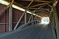 The inside of the bridge showing the Burr arch truss