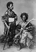 Fijian warriors, the one on the right with a gata