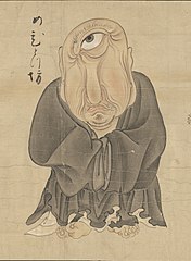 28 Mehitotsubō (めひとつ坊) means "Buddhist priest with one eye". Everything about his appearance is like a normal priest, except for the one eye in the middle of his face. He wears the black-and-white robes of a priest. He does not wear sandals, leaving his bare feet visible. His head is bald like a monk. He also has a long and ugly nose and face. His chin and face have black unshaven hairs growing, but they are not quite a beard or mustache. He also has one large eyebrow above his single eye.[1]