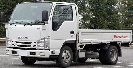 An Isuzu Elf medium duty truck