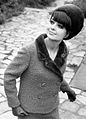 Fashion model from Leipzig, GDR wearing a wool suit trimmed with fur and a matching fur hat, 1966.