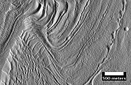 Surface of Nilosyrtis Mensae showing ridges and cracks, as seen by HiRISE, under the HiWish program