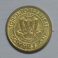 c. 1966 brass token