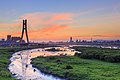 View of New Taipei Bridge and sunset skyline of Taipei in 2014.