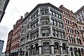 The 1872 Equitable Buildings represents one of the earliest uses of a cast iron facade in the city