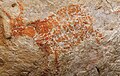 Image 58The oldest known figurative painting is a depiction of a bull that was discovered in the Lubang Jeriji Saléh cave in Indonesia. It was painted 40,000–52,000 years ago or earlier. (from Painting)