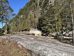 Jean-Noël Côté (1942-2007) Dam,[5][6] outlet of Lac Long and Noire River (Sainte-Anne River tributary) (source)