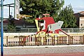 Thematic playground with agricultural machine