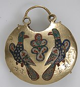 Front of a temple pendant with two birds flanking a tree of life; 11th–12th century; cloisonné enamel and gold; overall: 5.4 by 4.8 by 1.5 centimetres (2.13 in × 1.89 in × 0.59 in); made in Kyiv (Ukraine); Metropolitan Museum of Art (New York City)