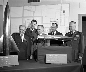 Theodore von Kármán inspecting two of the models used in wind tunnels at SM-65 Atlas, by the United States Air Force (restored by Crisco 1492)