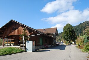 Two-story building with gabled roof