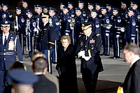 Ford being escorted by Army Major General Guy C. Swan III during a portion of the state funeral of her late husband