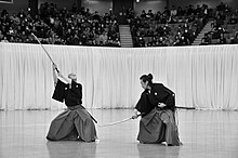 Master instructors Tazoe Shin-Ichiro (left) and Yamamoto Takahiro demonstrating at the Nippon Budōkan in Tokyo. - Photo by Hyoho Taisharyu Ryusenkan