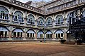 A courtyard of Mysore Palace during the day