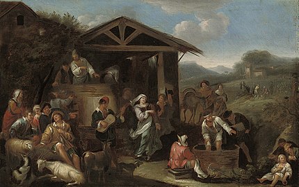 An Italianate landscape with peasants making merry and pressing grapes