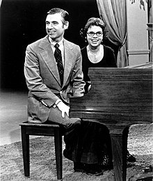 Rogers and wife Joanne Byrd sitting at a piano, 1975.