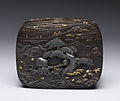 Iron, gold, and silver box showing a monkey and octopus tug-of-war