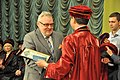 Mykhaylo Korda presenting a diploma of honorary professor of TNMU to Alfred Owoc