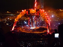 Large, red stadium stage at night