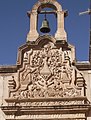 Detail of sculpture over door to chapel.