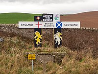 Railway sign showing the Anglo-Scottish border