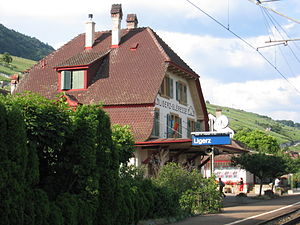 Three-story building with gabled roof